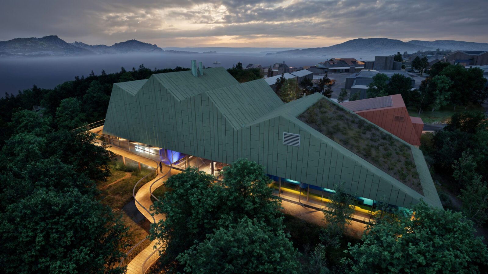 A rendering depicting an oblique aerial drone view of a building with a blue-green roof and lighting tailored to the site along curved wooden walkways. It is evening, and a fjord surrounded by mountains is visible in the background.